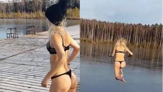Момиче по бельо се хвърли в заледено езеро в Русия (ВИДЕО)