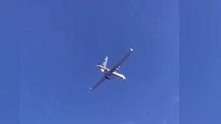 Руски военен самолет преминава опасно близо до американски шпионски дрон (видео)