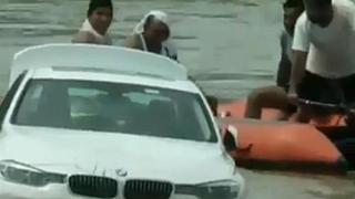 Мъж получи BMW за рождения си ден и го бутна в реката (видео и снимки)