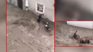 Мъж прави невъзможното да спаси други при наводнението в Австрия (видео)