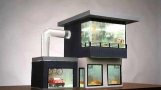 Модерен аквариум за рибки като къща с гараж и БМВ в него (видео)