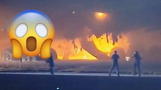 Камера засне горящ самолет с 400 души на борда на летището в Токио (видео)