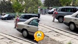 С цената на всичко: Жена пази паркомясто в "Люлин", въпреки че шофьор я "подбутва" с колата си (видео)